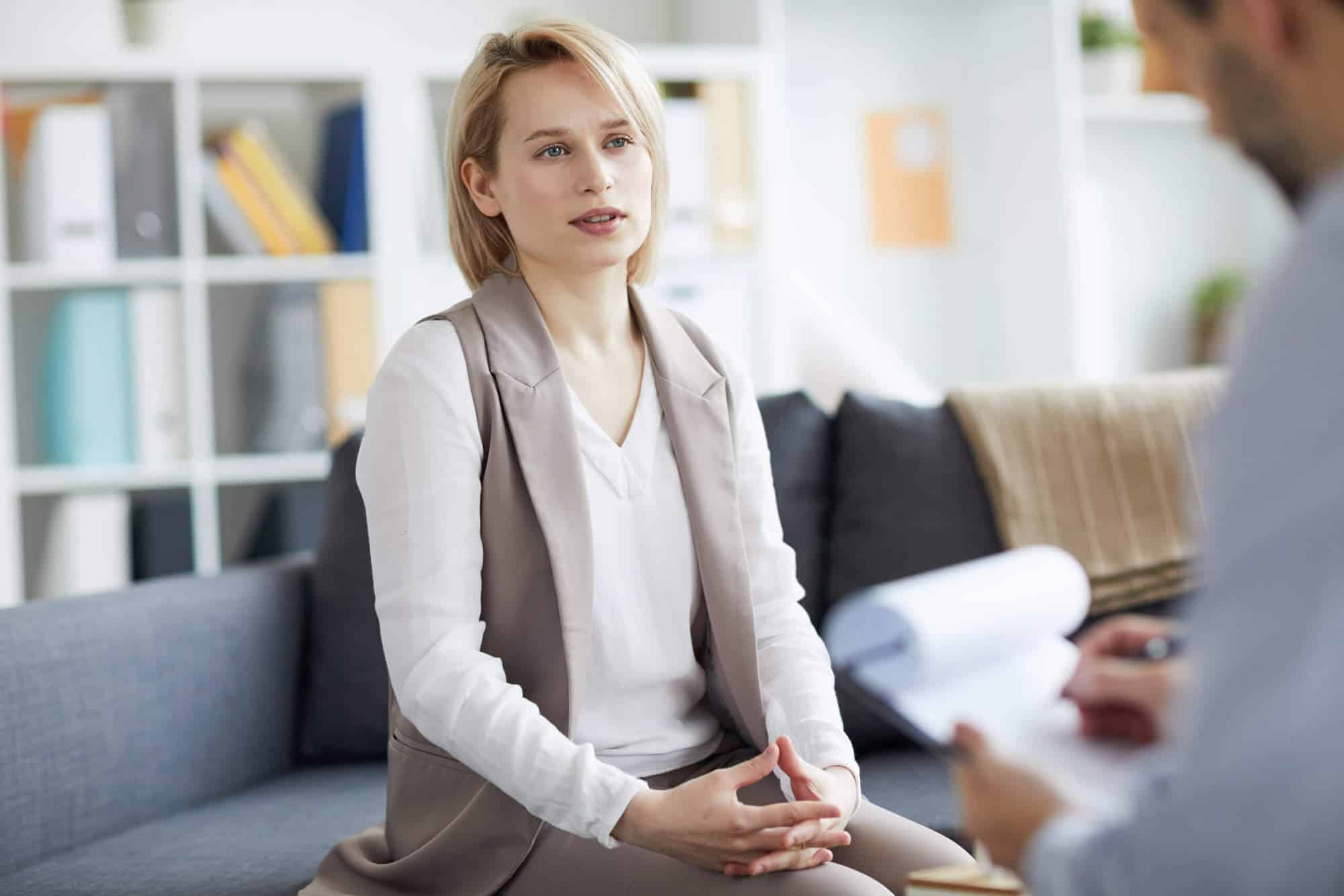 Adult talking with a therapist